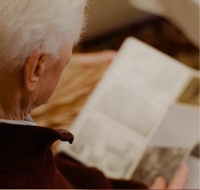 An older man reading an old document